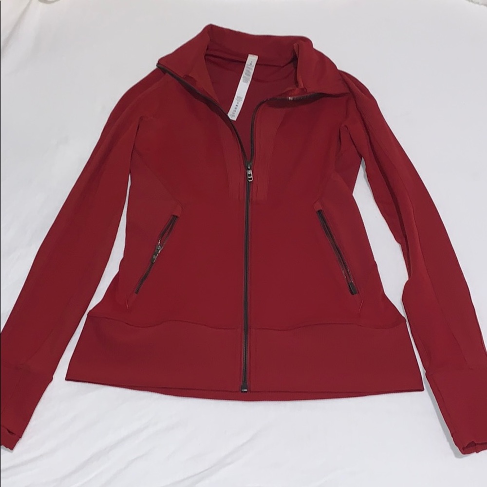 Lulu movement to movement zip up. New without tags